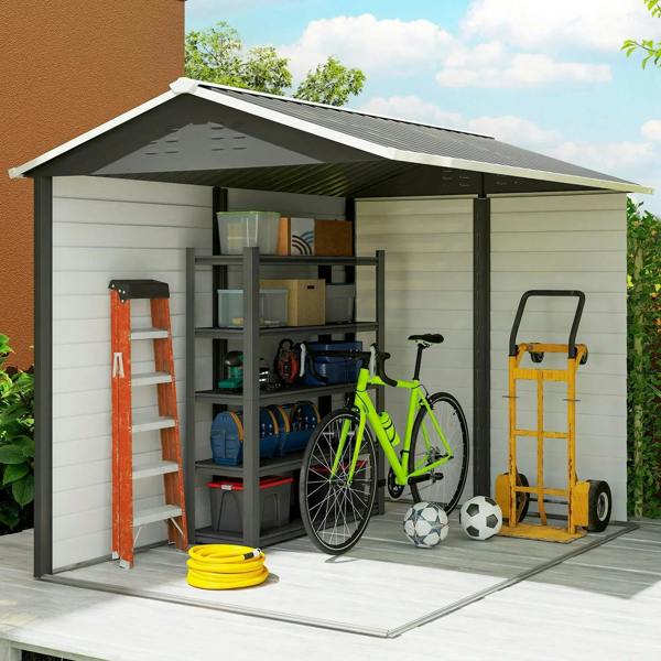Metal garden shed interior with open door and storage shelving