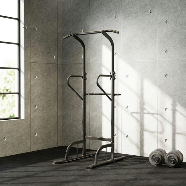 Black power tower dip and pull-up station standing in corner with stable steel base