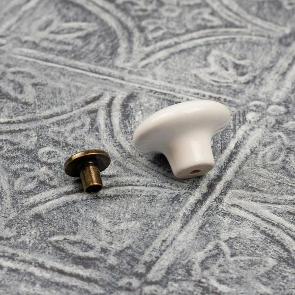 White ceramic round mushroom knob with antique centre