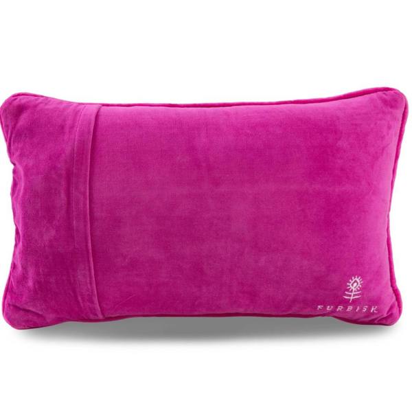 The reverse side of a rectangular statement cushion, showing a smooth bright pink velvet backing with an envelope closure and a small white embroidered Furbish Studio logo in the bottom right corner.