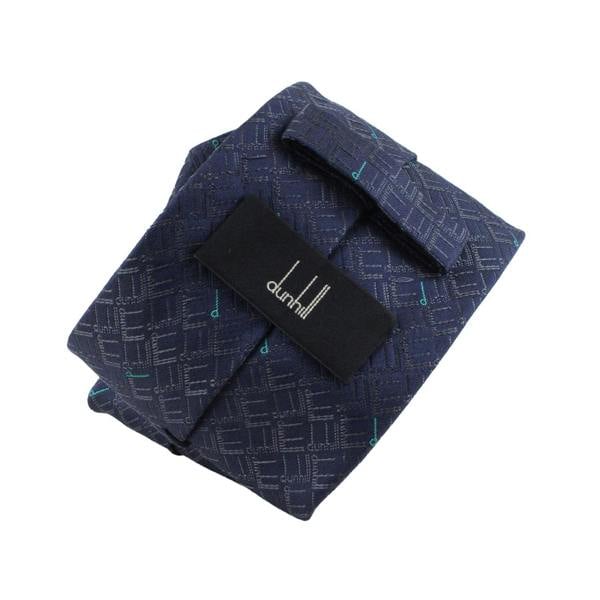 Dunhill luxurious silk tie in a longtail logo with contrasting scattered d pattern