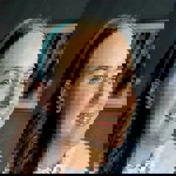 Teal hair band, smooth satin fabric, padded wide band style, bold teal colour, chic and versatile accessory, comfortable everyday hairband
