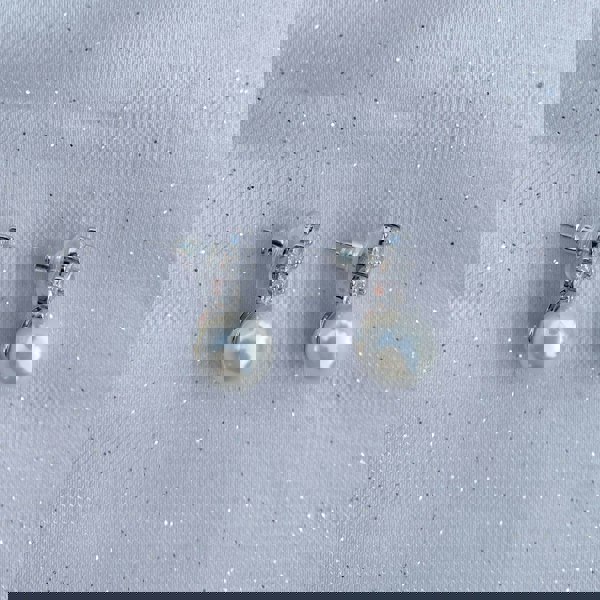 pearl drop earrings small silver post