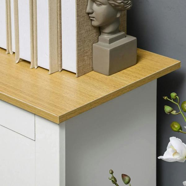 White sideboard cabinet with wood-grain tabletop edge and recessed front panel