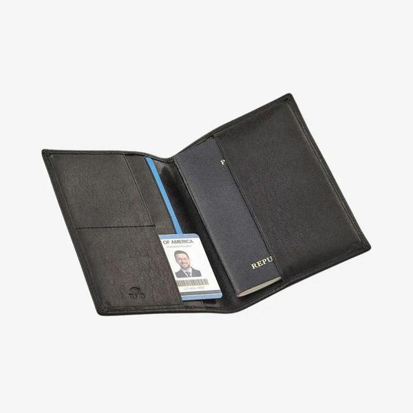 Black leather passport holder with a card holder on a white background
