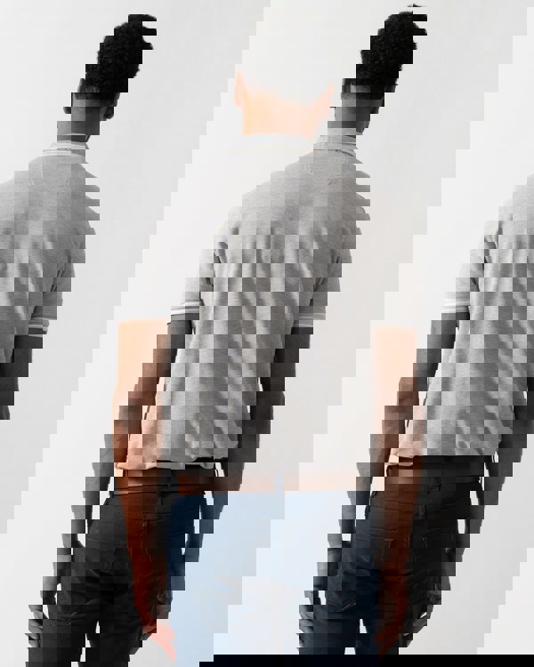 Back shot of a Model wearing a BOSS Green Paddy Mens Cotton-Piqué Polo Shirt with Contrast Logo in Silver