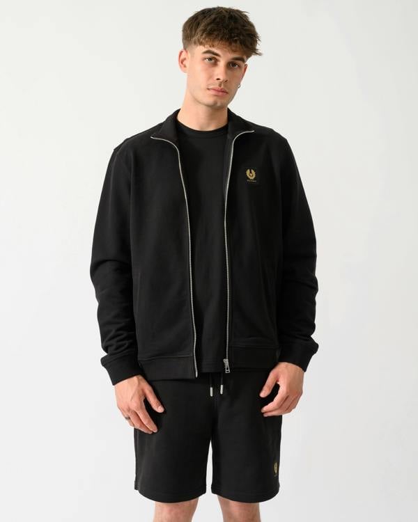model wearing a Belstaff Mens Logo Full Zip Sweatshirt in Black