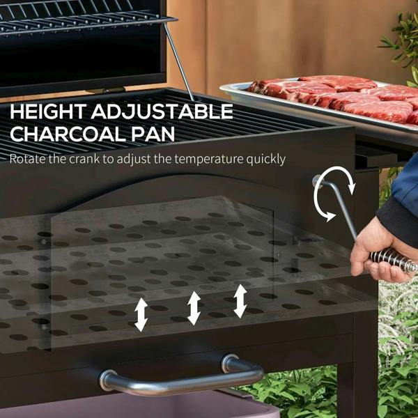 Black BBQ grill with height-adjustable charcoal pan inside the firebox