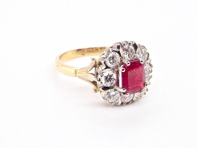 Vintage Tom A fine ruby and diamond cluster ring