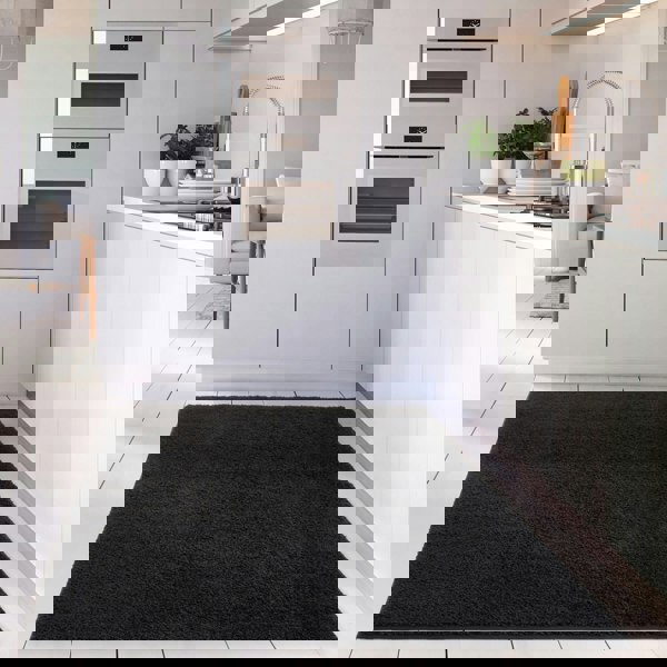 Black shaggy Rug Plain design thick pile, high quality, soft & durable.