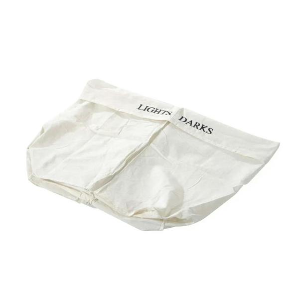 Two-section white liner bag for laundry hamper labeled “LIGHTS” and “DARKS”