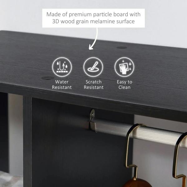 Black wardrobe interior with hanging rail and molded surface protection features, close-up