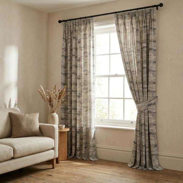 Tasa made-to-measure curtains in Platinum, styled in a living room