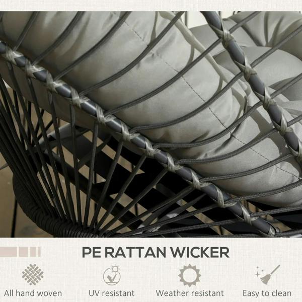 Woven PE rattan egg swing chair with light grey cushion pads close-up