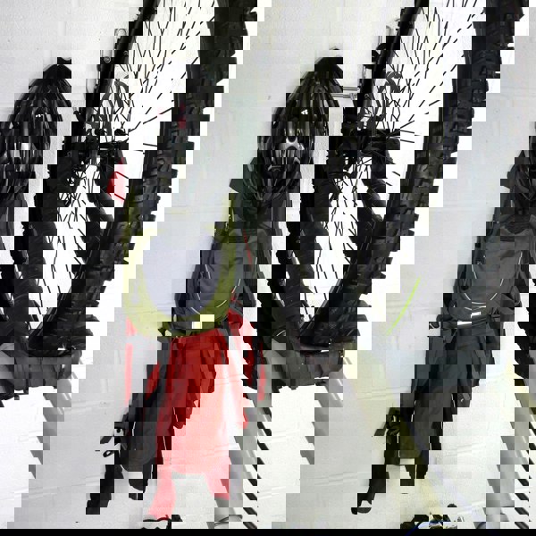 Bike hanger for 1 bike plus helmet, backpack and coat shown with a mountain bike, backpack, coat and helmet