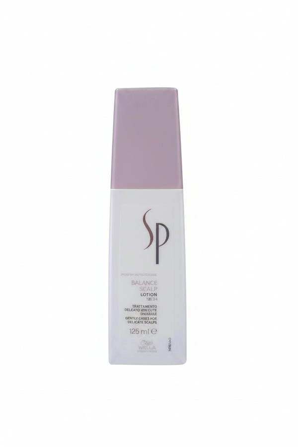 SP brand lotion bottle with purple cap on a white background