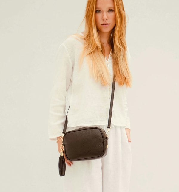 The Tassel Black Leather Crossbody Bag With Cappuccino Dots Strap