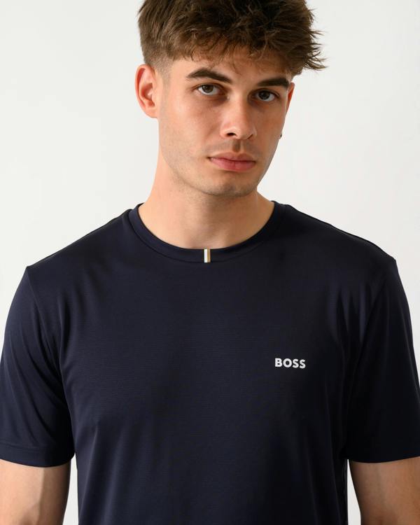 close up shot of a model wearing a BOSS Green TOC Game Mens T-Shirt in Dark Blue 402