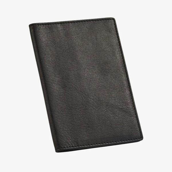 Black leather passport holder on a white background
