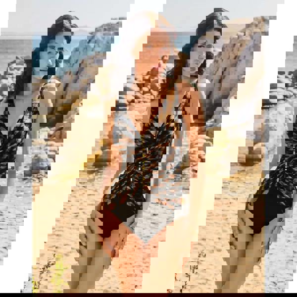 Black and gold Miraclesuit Raya safari charmer swimsuit with zipper front