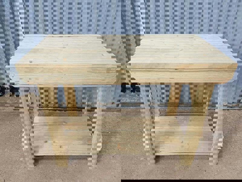 Indoor/Outdoor Pressure-Treated Single Shelf Workbench, a robust and versatile solution for all your workspace needs. Handcrafted in the UK, this workbench is constructed from high-quality, pressure-treated timber, ensuring durability and resistance to the elements, making it suitable for both indoor and outdoor use.