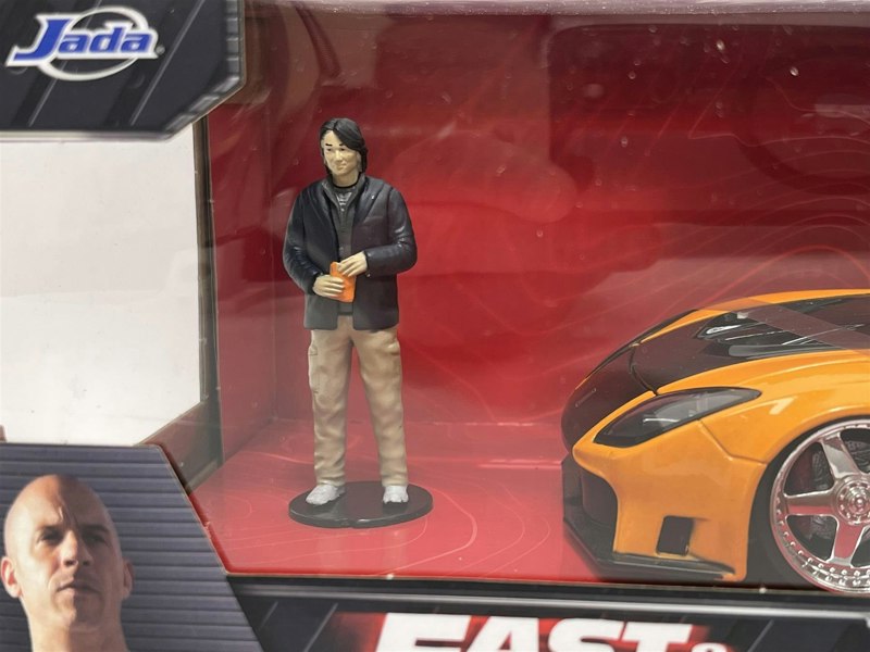a toy figurine in a box