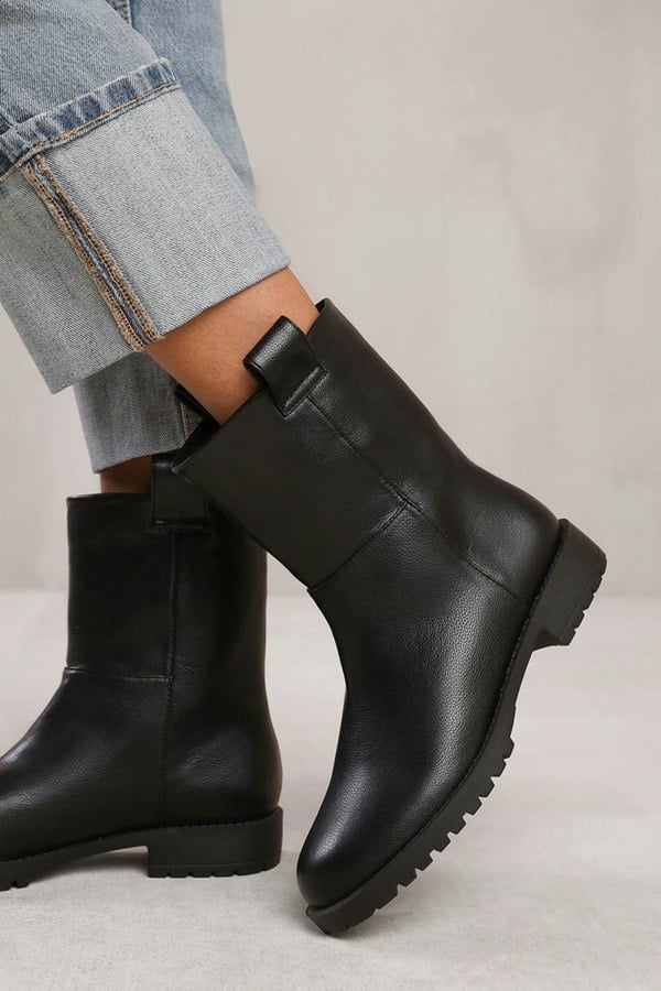 Where's That From Delta Mid Calf Boot With Stitching Detail in Black Grain Faux Leather