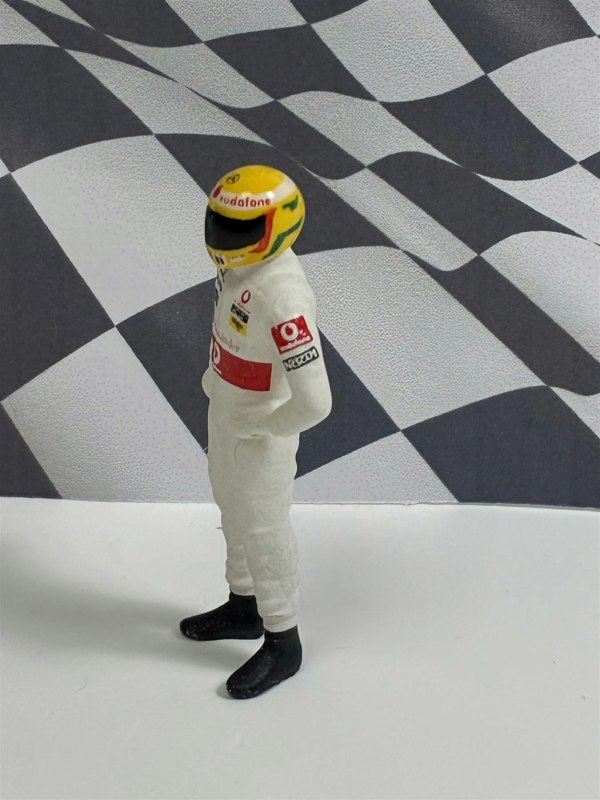 a toy figure with a helmet on