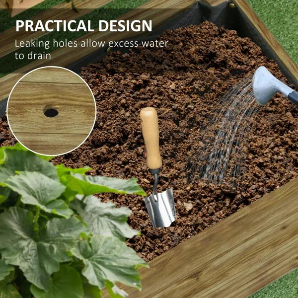 Natural wood raised planter filled with soil and visible drainage holes