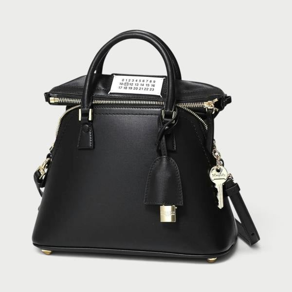 Supplied Fashion Maison Margiela 5AC mini tote bag in black leather with signature numeric logo and gold key charm