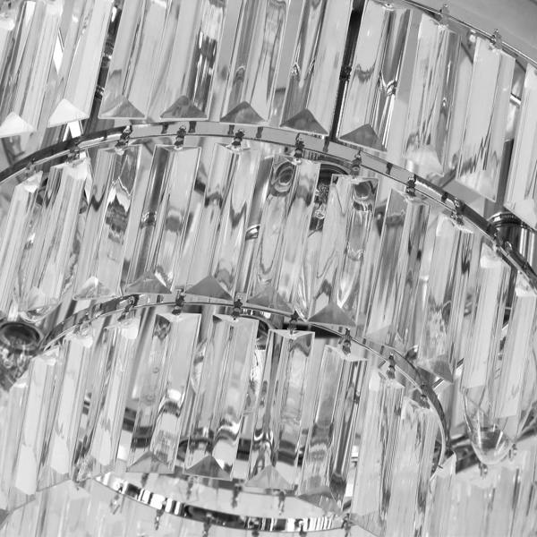 Close-up of silver crystallite ceiling chandelier with clear faceted crystal columns