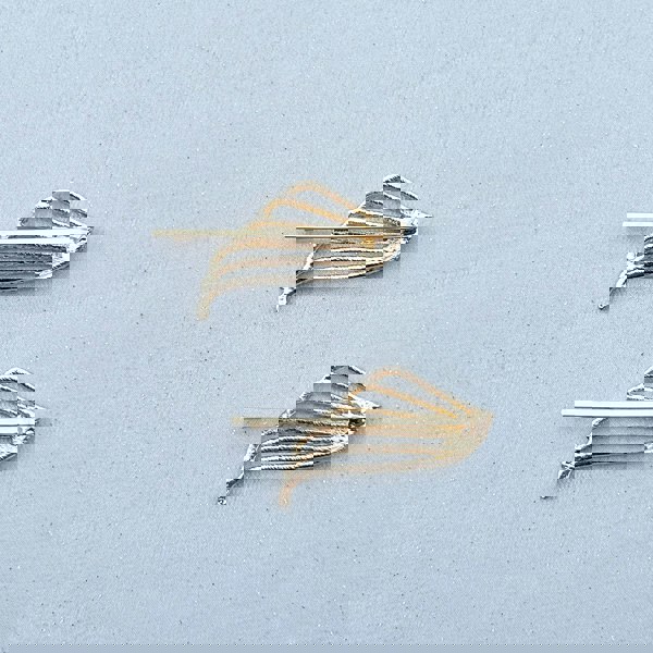 Gold hair slides set, art deco style, crystal embellishments, vintage inspired design, elegant decorative hair accessories
