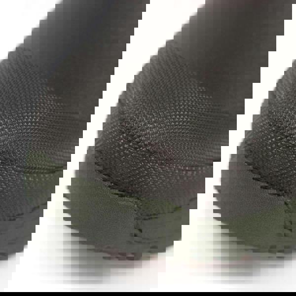 Grisport GriSport Creek Womens Mid-Cut Neoprene Country Stable Farm Wellies Boots, close-up of the textured black rubber toe cap and part of the green sole showing durability and waterproof design.