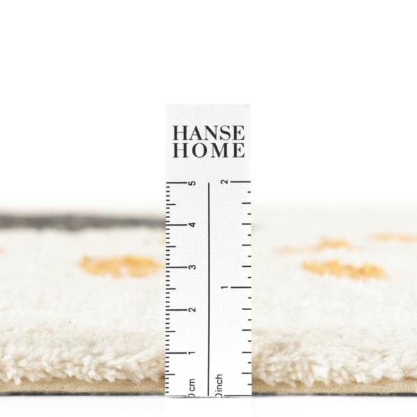 Hanse Home rug with a ruler for scale on a white background