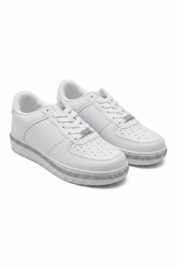 A pair of white low-top sneakers with silver glittery soles and silver metal logo accents on the sides, displayed against a clean white background.