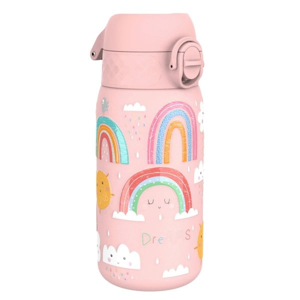 A pink children's water bottle, featuring rainbows, clouds, and suns, sits on a white background. The word "Dreams" is printed on the bottle.