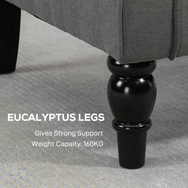 Dark grey armchair with turned glossy legs in a dark finish