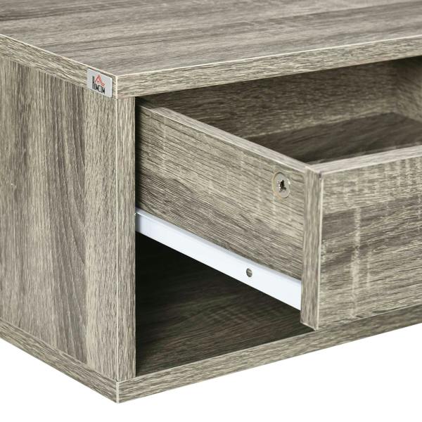 Grey wood-effect bedside table corner with drawer front and open shelf interior