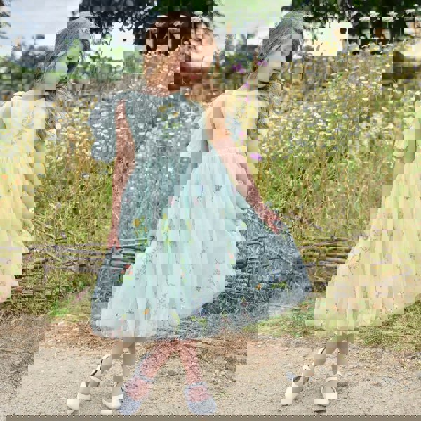 pretty girl modelling a mint coloured dress