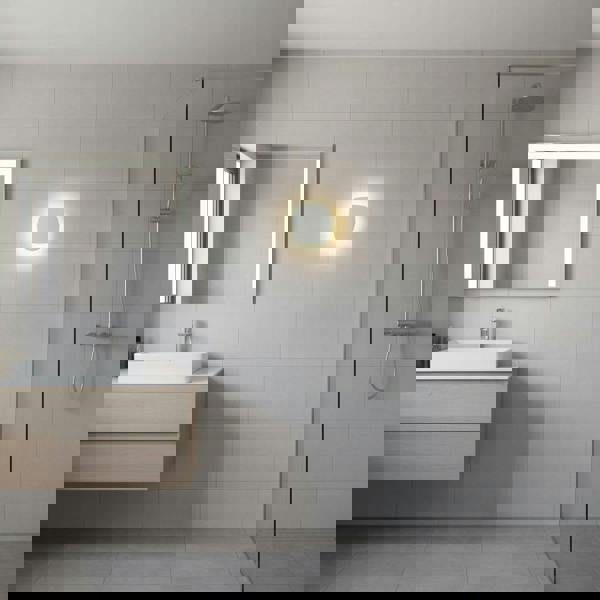 white bathroom wall mount light fixture mounted on the wall in a modern bathroom 