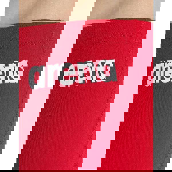 Red Arena boys team solid swim jammer with white logo straps