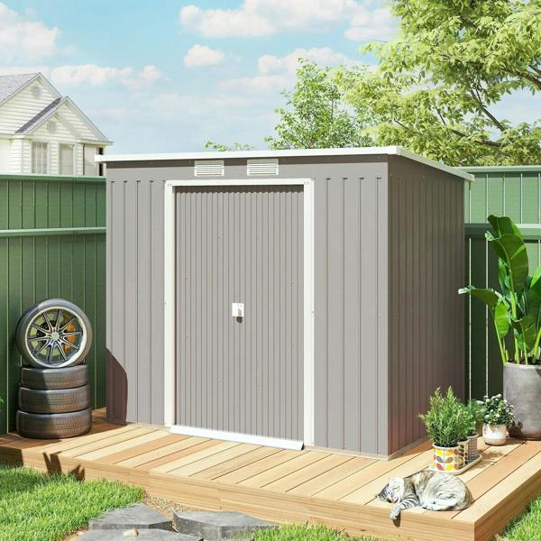 Grey metal garden shed with single door, on a raised wooden platform in the yard