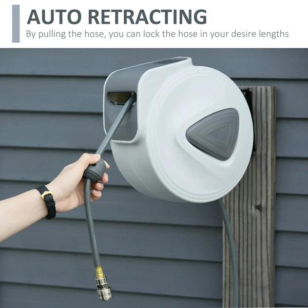 White retractable air hose reel with grey hose being pulled out from the side inlet
