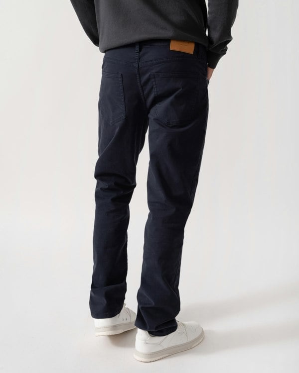 Model is wearing GANT Mens Regular Fit Desert Jeans in 433 Evening Blue - Back