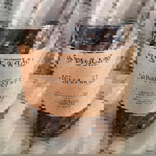 Amber & Rock salt scented candle in black tin with 2 wicks