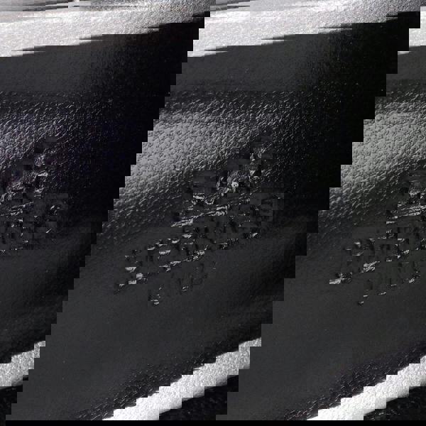 Hermes Trocadero mules in a metallic silver grained leather