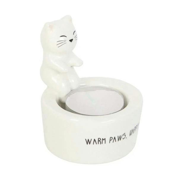 White cat tealight holder, side view with engraved “WARM PAWS, HAPPY HEART” wording