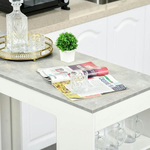 Grey tabletop with magazines and decor items on a white bar table