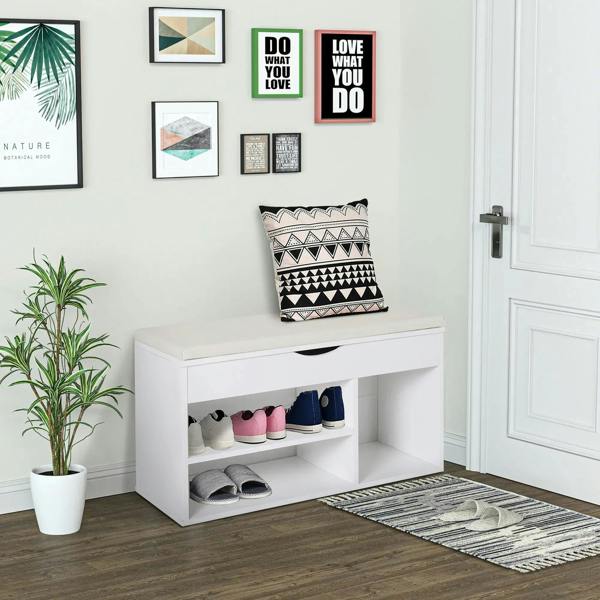 White shoe cabinet bench with padded seat and open cubby shelves for shoes