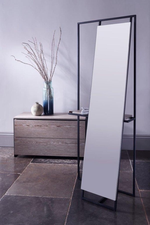 standing mirror on stone floor
